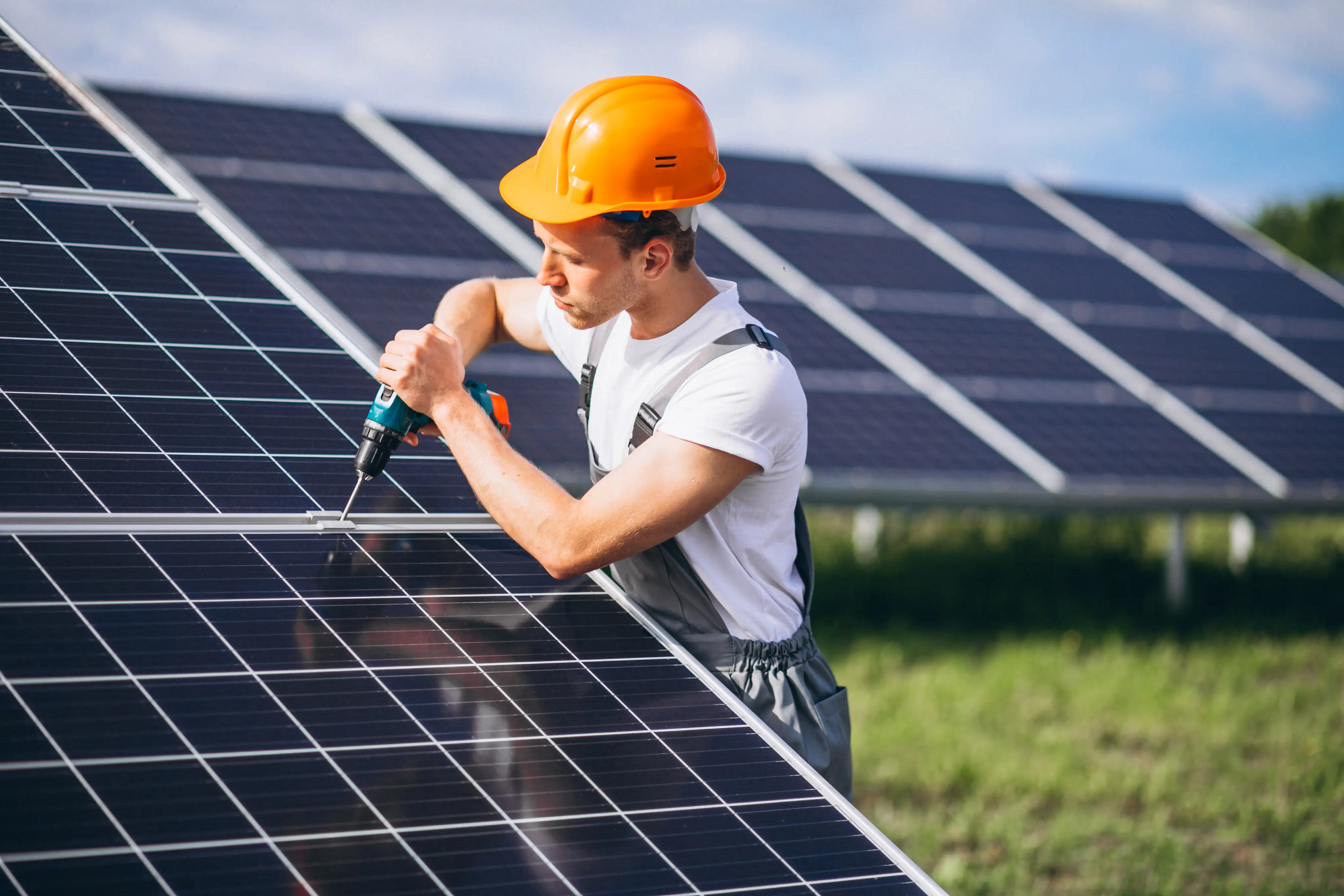 Solar installer mounting photovoltaic grid modules